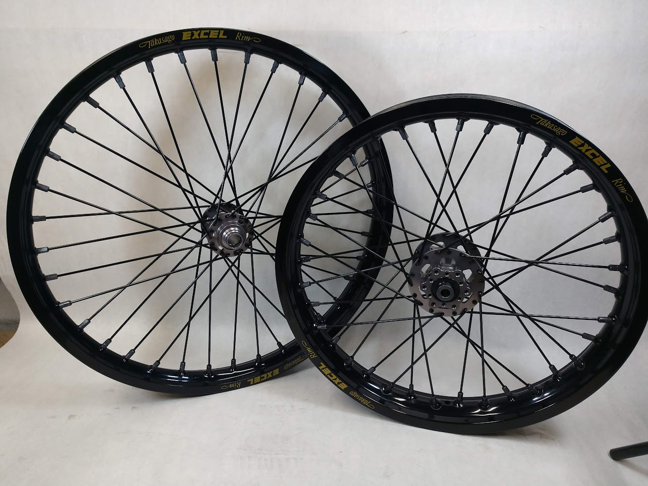 Sur Ron / Talaria Black Excel Takasago Rims & New Grey Hubs and Nipples Black Spokes 21/18