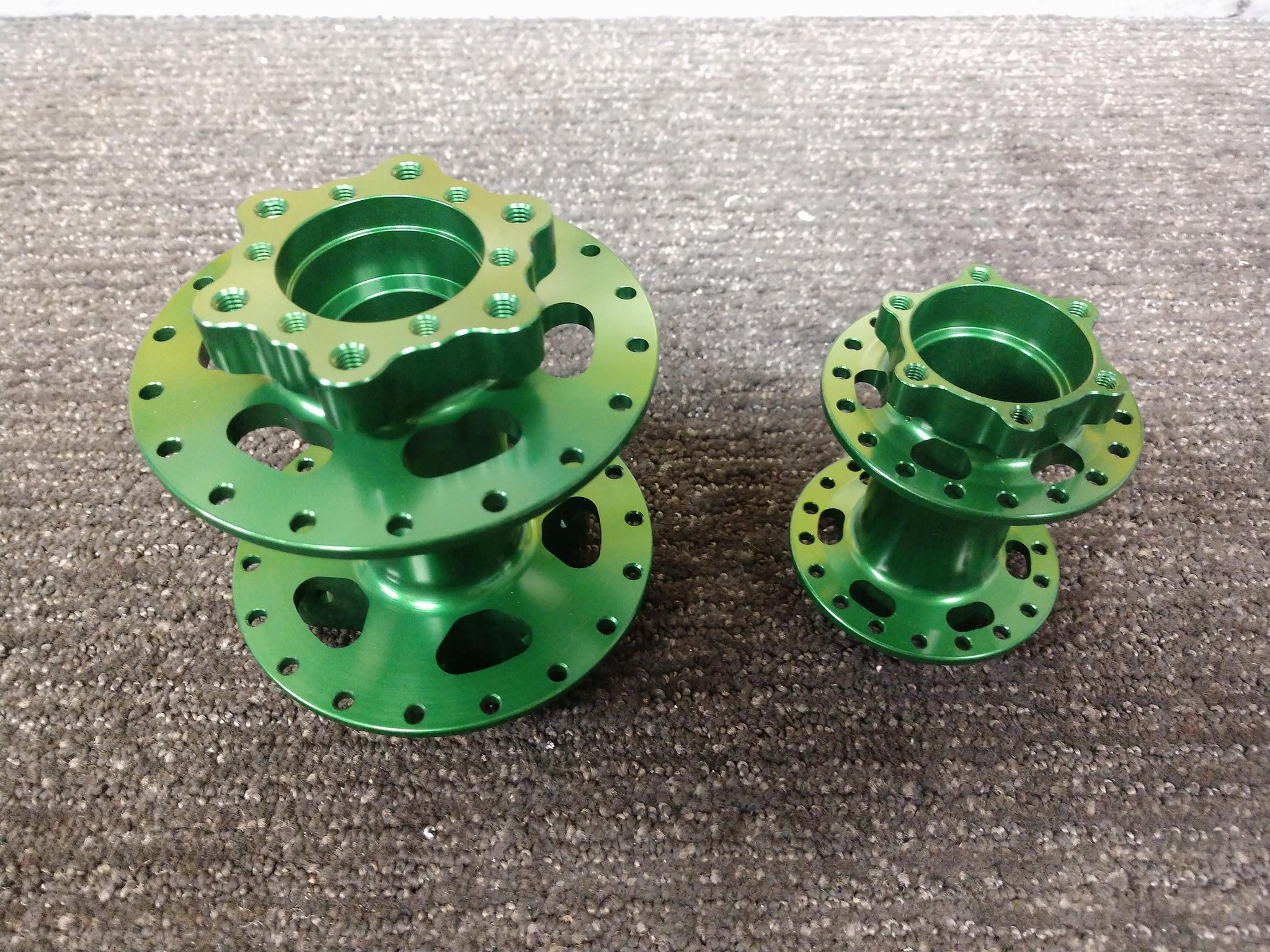 Woody's custom billet front and rear hubs for Sur Ron e-bike.