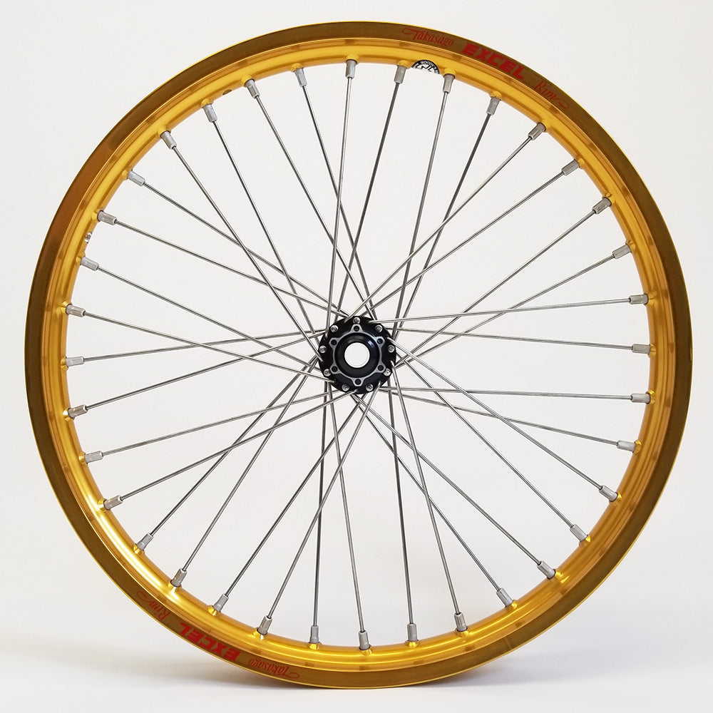 Woody's custom wheel with gold Excel rim and black hub