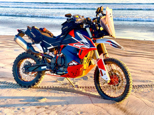 KTM 950 with custom Woody's Wheels installed (black rims and orange hubs)