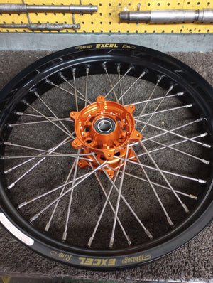 Black wheel with orange hub