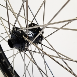 Close up of Woody's custom billet hub for Sur Ron e-bike