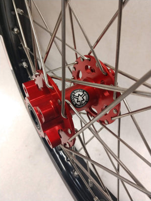 Close up of Woody's rear red billet hub for Sur Ron e-bike