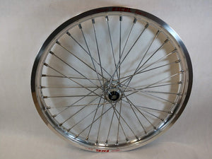 Woody's custom front wheel for Sur Ron e-bike featuring silver Excel rim w/ silver billet hub.