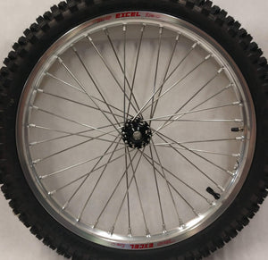 Woody's custom front wheel for Sur Ron w/ silver rim and black hub.